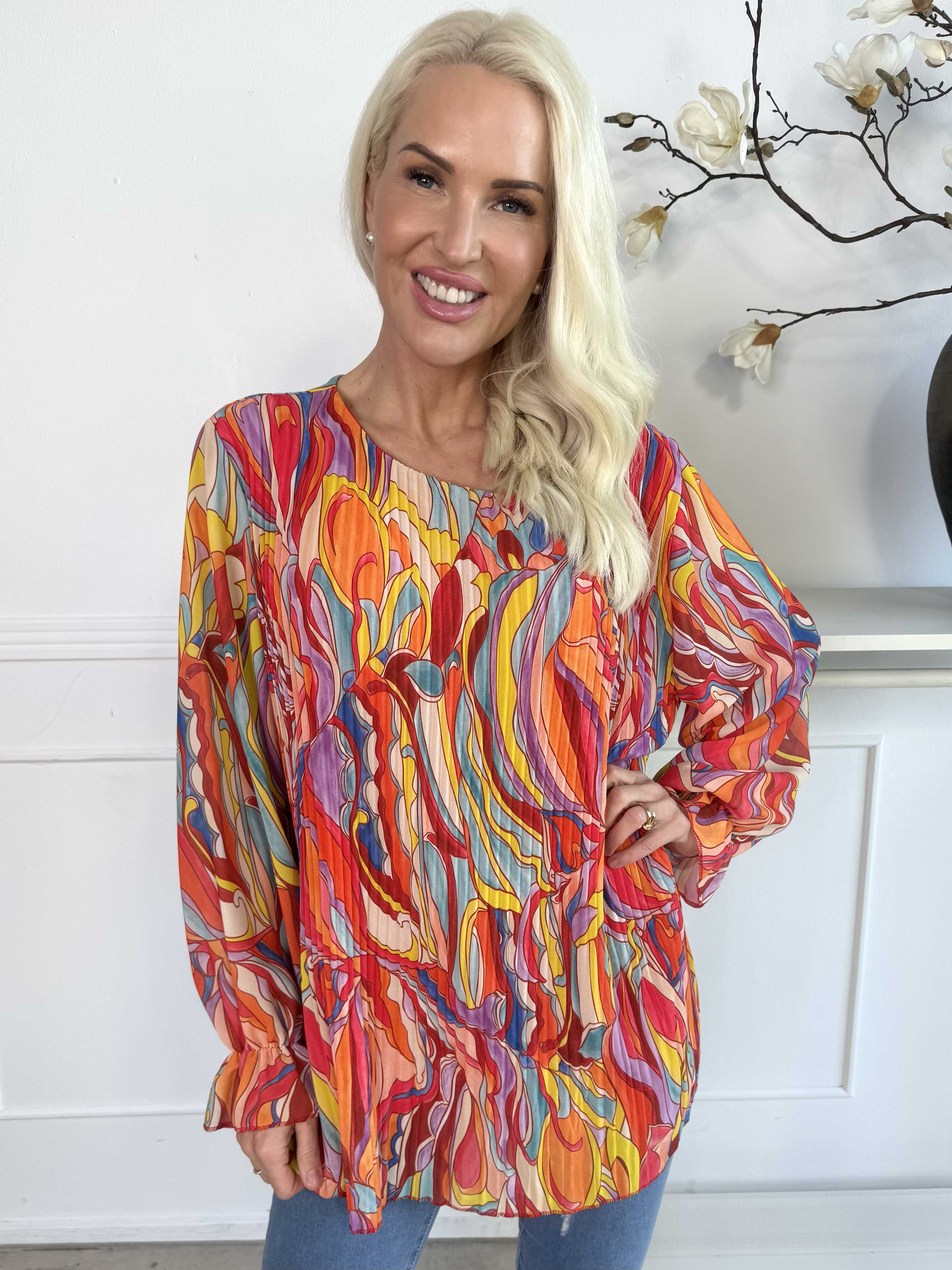 Lilia - Mönstrad plisserad blus